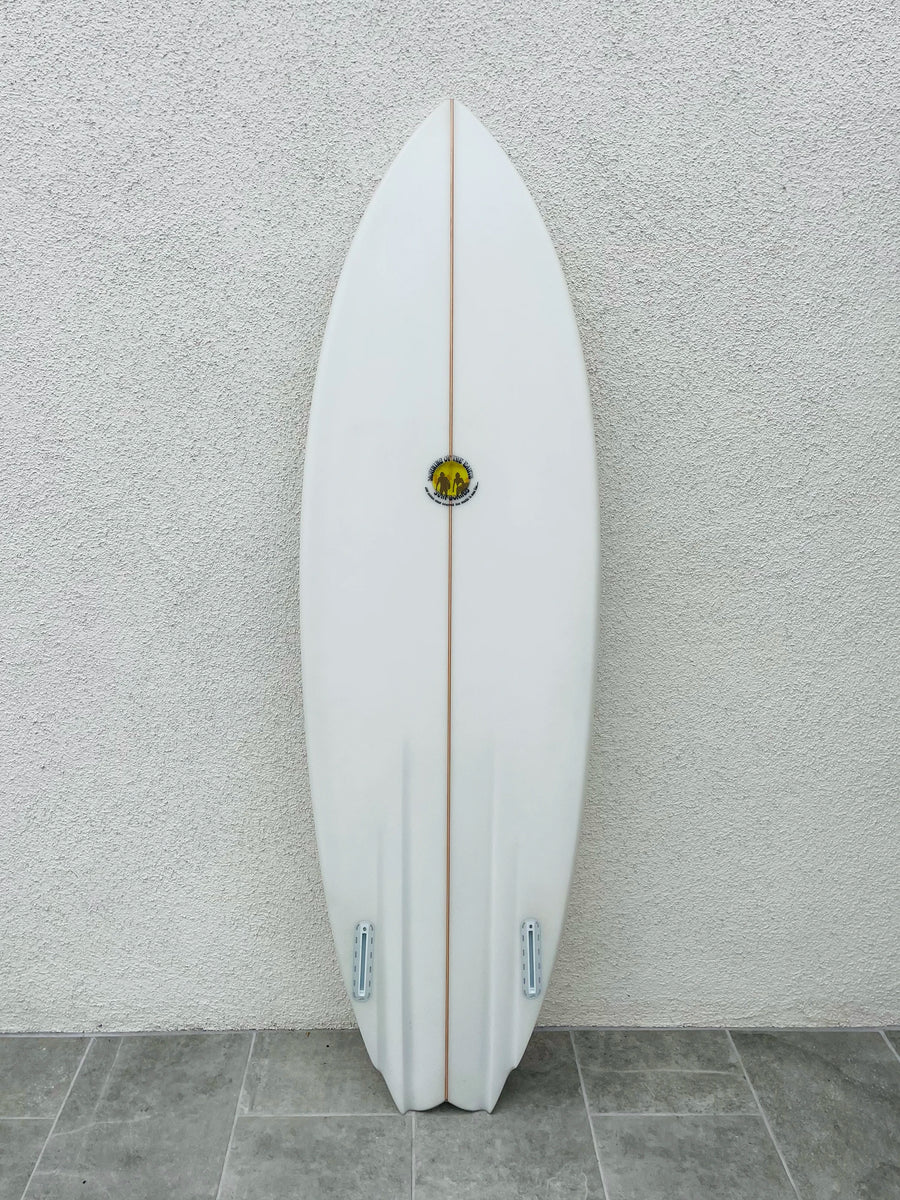 Morning Of The Earth | 5'6” Tracks Twinny Clear Surfboard (USED) Morning Of The Earth | 5'6” Tracks Twinny Clear Surfboard (USED)