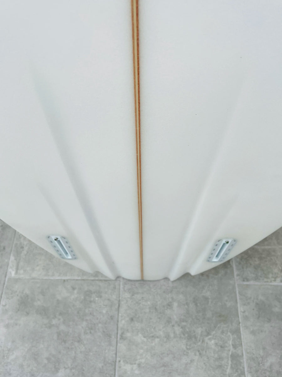 Morning Of The Earth | 5'6” Tracks Twinny Clear Surfboard (USED) Morning Of The Earth | 5'6” Tracks Twinny Clear Surfboard (USED)