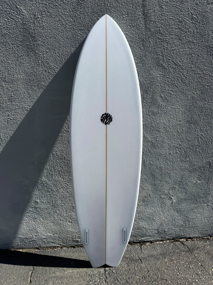 Simon Jones Designs | 6'2” Tracks Twinny Clear Surfboard Simon Jones Designs | 6'2” Tracks Twinny Clear Surfboard