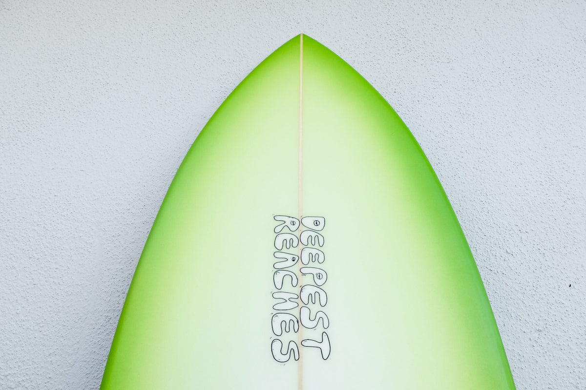 Deepest Reaches | Kozmk Kruzr 7’1" Single Fin Green Fade Surfboard Close Up