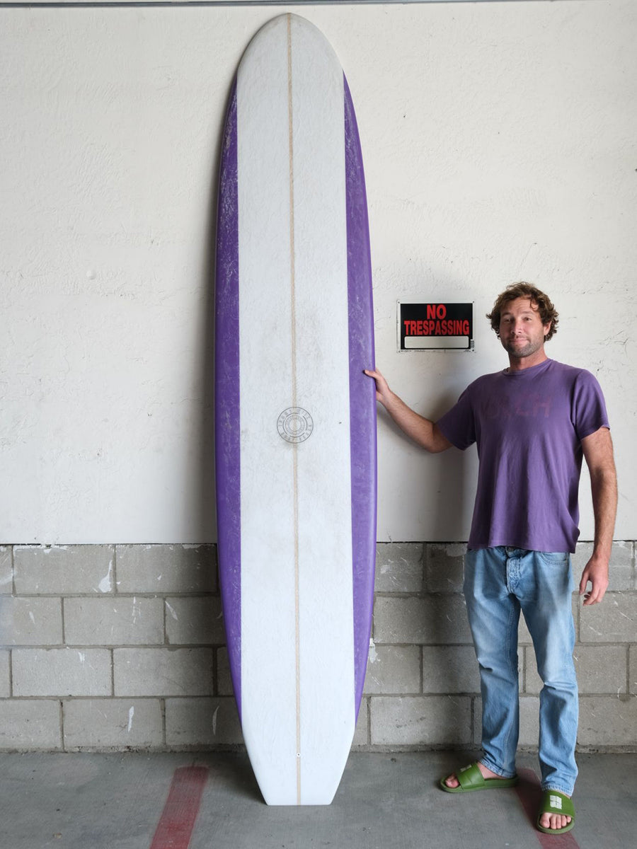 Tommy Witt Surfboards | 9’6” Tommy Witt Noserider Purple Rails Longboard (USED) - Surf Bored